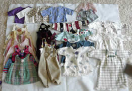 Custom sewing with loveand hand made doll outfits - bibs, shorts, dresses, jumpers, pajamas, pjs, pants, shorts and more.  From the maker of all natural and pure wholesome ingredients - Windy Ridge Handcrafted Bath and Body All natural products.