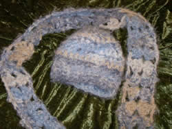Handsewn crocheted and knitted Matching scarf and hat is handmade by Windy Ridge Handcrafted in Aplington Parkersberg, Iowa, and in the same product line of the pure and organic bath and body products that we make.