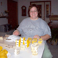 Angela Scanlan making all natural and pure organic bath and body soaps and other products for Windy Ridge Handcrafted in the Aplington-Parkersburg, Iowa, local area.